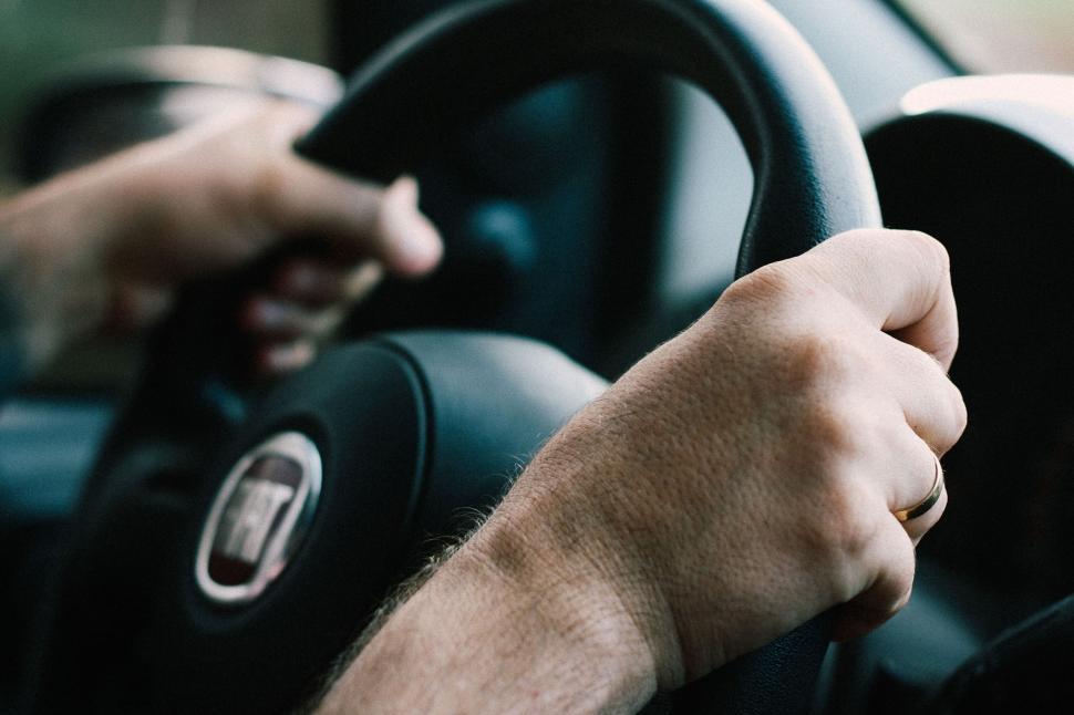 hands on steering wheel